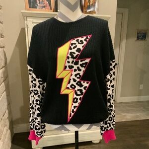 Crazy Train lightning bolt sweater.